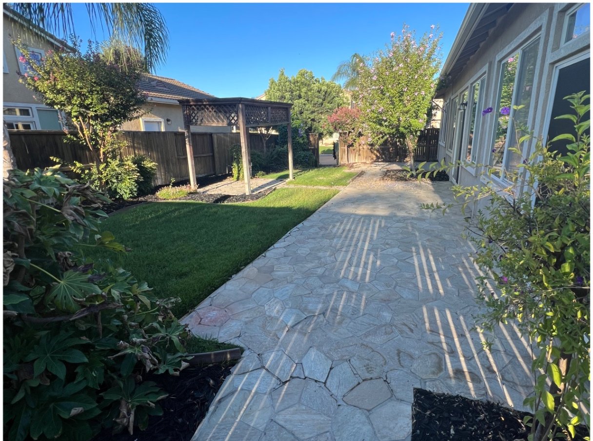 Patio removal & site clearing — before